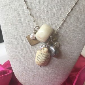 AP Kenya, Ashley Pittman charm necklace, hand made in Africa.